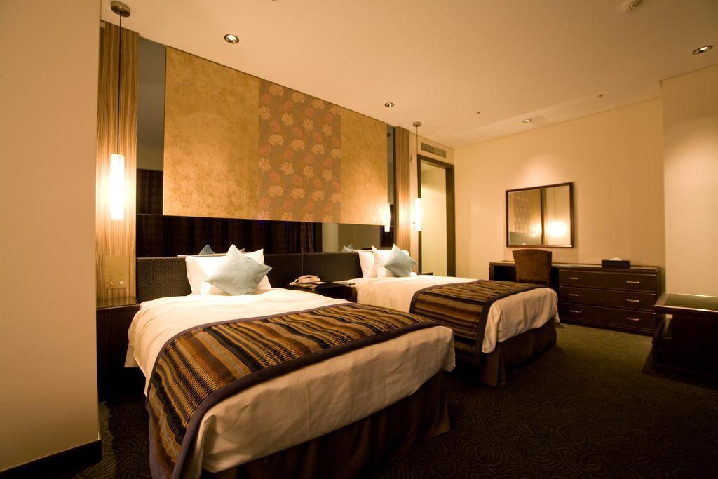 Okinawa Kariyushi Urban Resort Naha Quarto foto